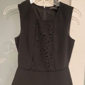 Laser cut peplum top